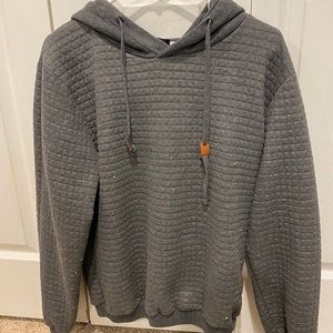 Grey hoodie.